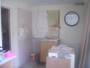 Photo of kitchen - with gas pipe exposed